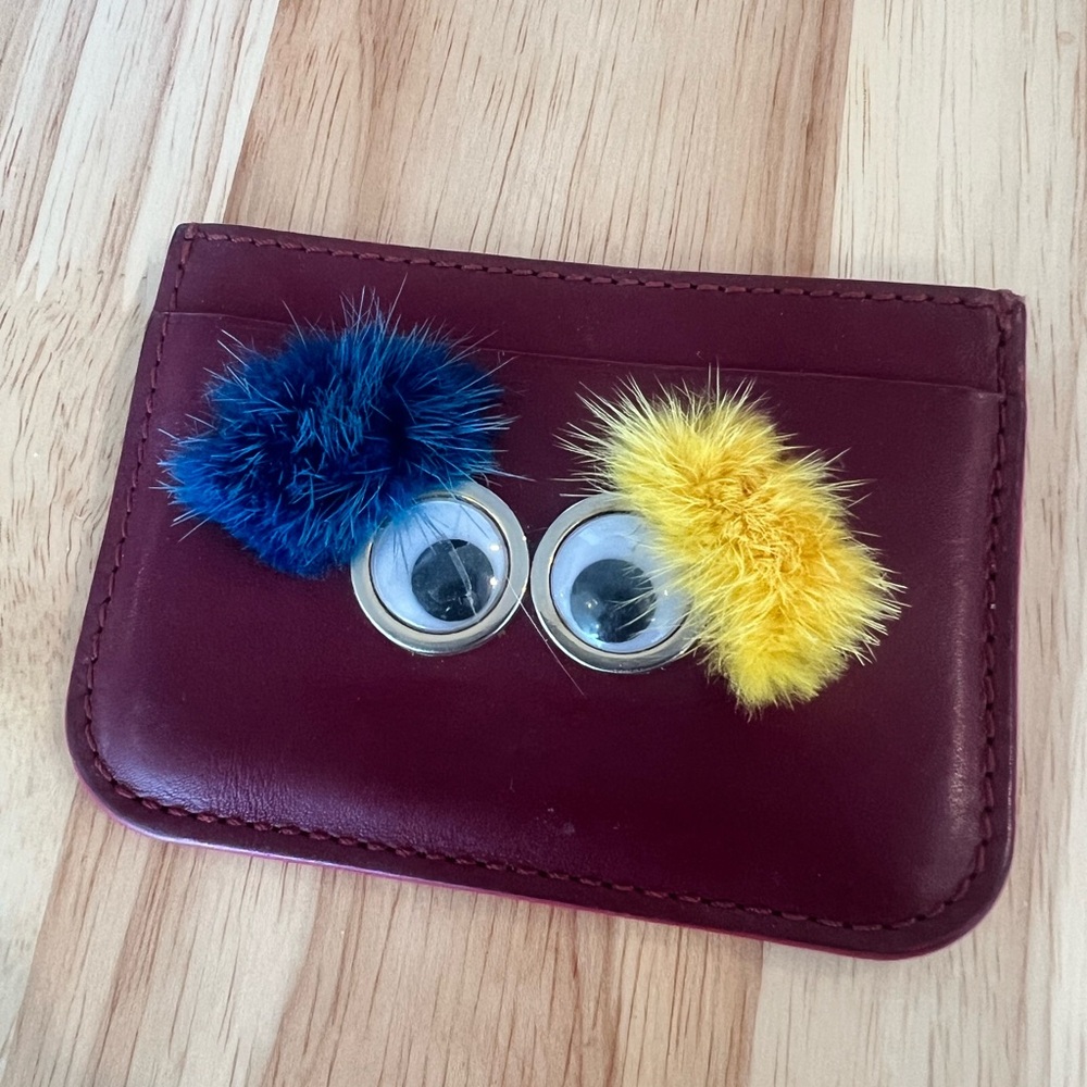Sophie Hulme Burgundy card holder with goggle eyes 👀